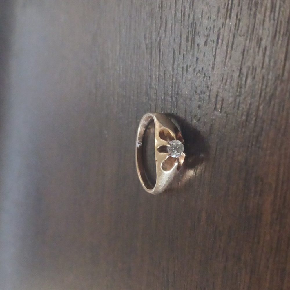 14 karat vintage estate sale gold ring size 2 with .10 karat diamond